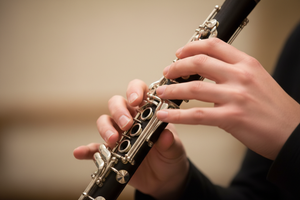 playing clarinet, zoom in